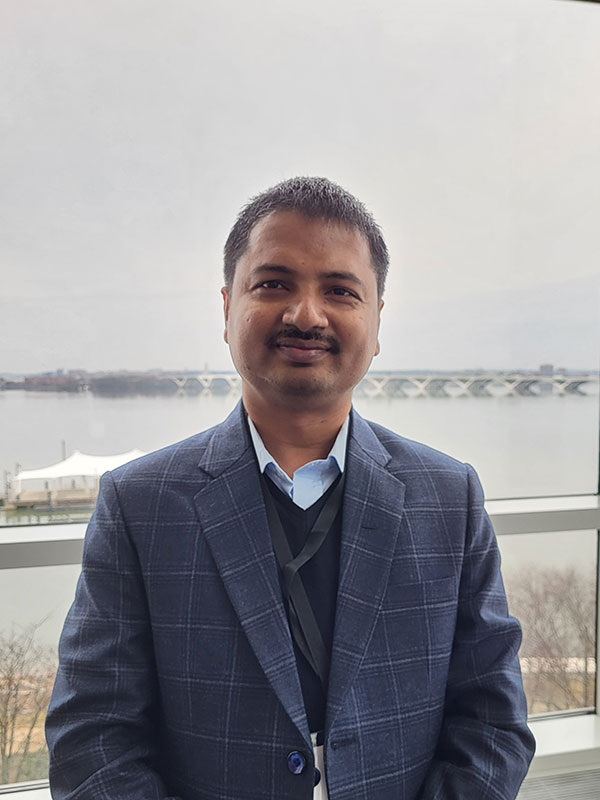 STRATEGIC CONTRIBUTIONS — Year-round graduate intern Toya Acharya from Prairie View A&M working in Sandia’s Strategic Cyber Initiatives department uses his technical skills to detect host attacks earlier in the cybersecurity “kill chain.” (Photo courtesy of Toya Acharya)