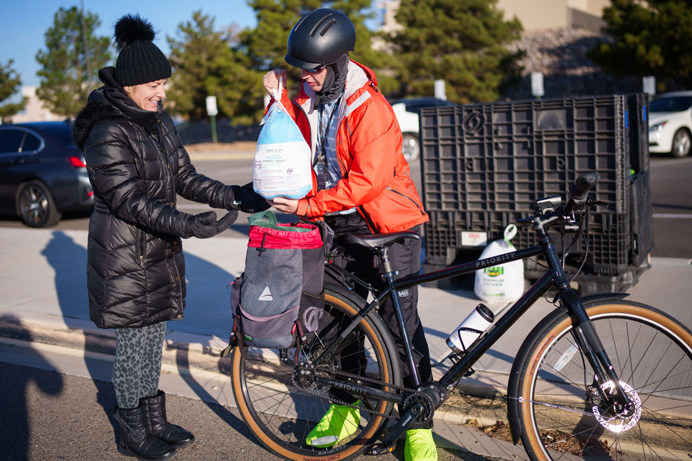TALK TURKEY — An employee drops off a turkey near the Steve Schiff Auditorium Nov. 14. (Photo by Craig Fritz)
