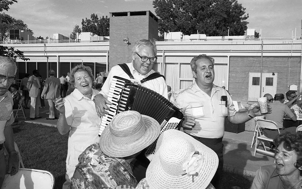 RETIREE PICNIC — John J. “Mike” Michnovicz plays the accordion as entertainment in 1982.