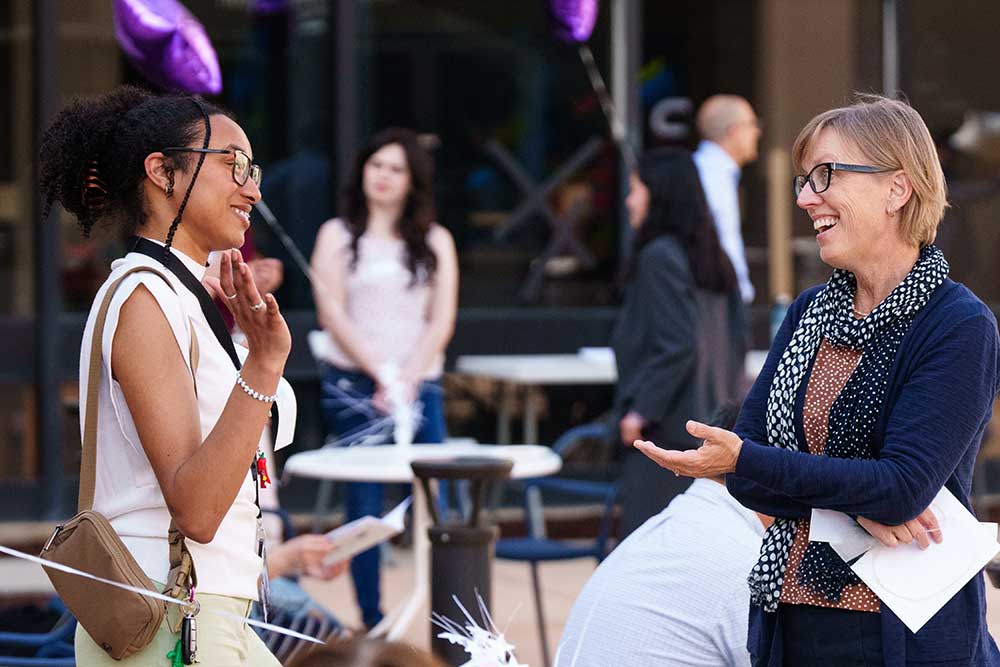 SHARING STORIES — Participants chat at the Math & Science Awards.