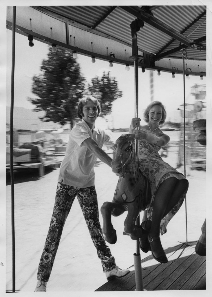 POLYESTER PATTERNS — Rocky Medina and Terry Caress show off looks to be featured at a summer fashion show in 1974. (Photo from the Lab News archives)
