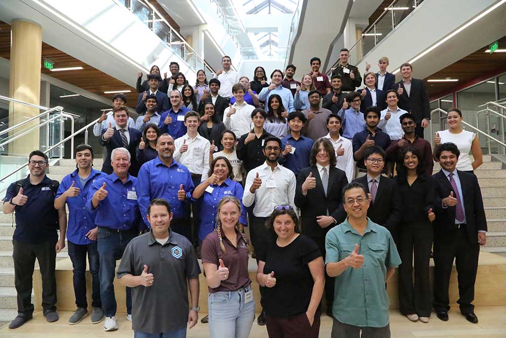 CREATING CONNECTIONS — Texas A&M students and Sandians, including Campus Partnership Manager Andy Brewer, front row far left, at an Aggies Invent event in November. (Photo courtesy of Andy Brewer)