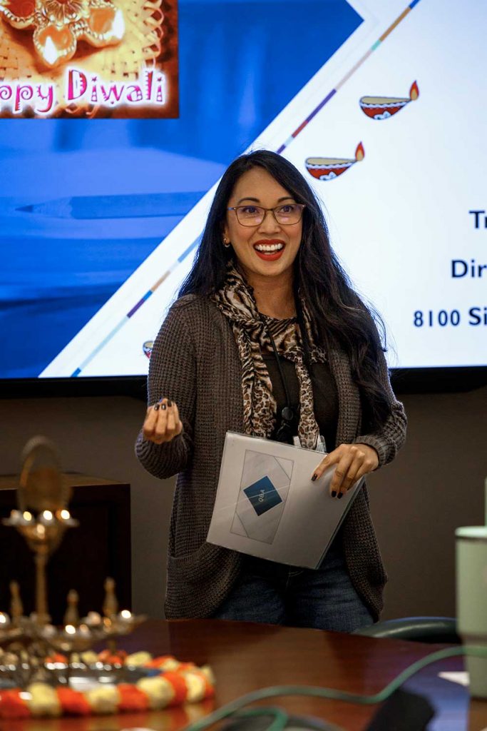 DIWALI EMCEE — Deputy Associate Labs Director for Integrated Security Solutions Trish Benguerel kicks off the Diwali event on Oct. 30 with a few words on behalf of the Asian Pacific Leadership Committee that organized it.