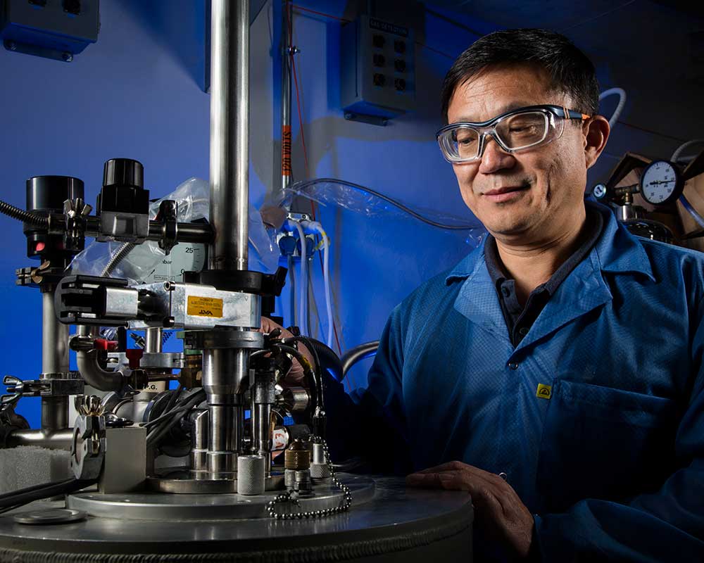 POSITIVELY CHARGED — Wei Pan was appointed as a Fellow of the American Physical Society for his work to innovate how quantum states of matter are researched. (Photo by Randy Wong)