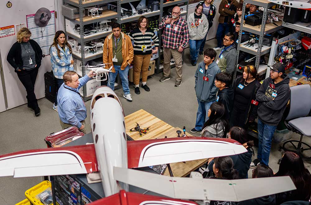 PASSIONATE ABOUT SCIENCE — Kristopher Klinger shares his passion for science and inspires future generations during a school tour in the Uncrewed Aircraft Systems Counter-UAS Lab last fall. (Photo by Craig Fritz)