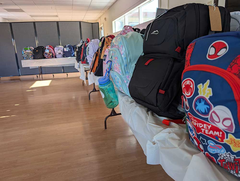 GET THE GEAR — Backpacks are ready and waiting to be picked up by families at Parks Reserve Forces Training Area in Dublin, California.