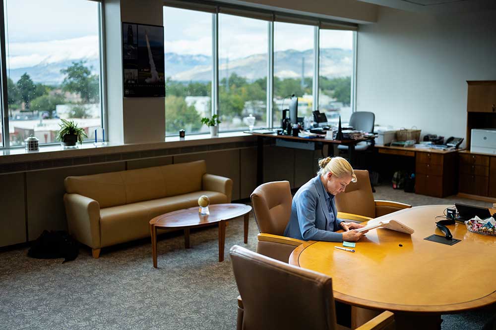FINAL REVIEW — Labs Director Laura McGill reviews this year’s stockpile assessment letter in her office. The letter is the culmination of a yearlong process to certify the U.S. stockpile is safe, secure, reliable and effective. (Photo by Craig Fritz)
