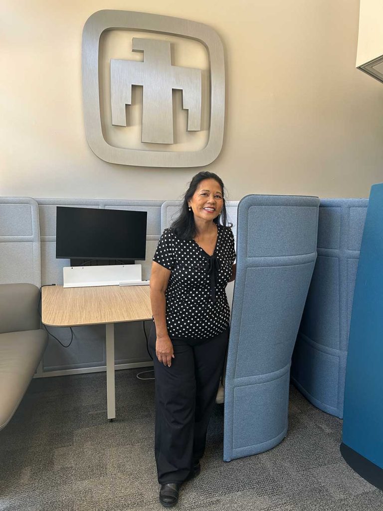 NEARING RETIREMENT — Martha Campiotti smiles in the lobby of Sandia California’s Combustion Research Facility in August 2025. (Photo by Lea Blevins)