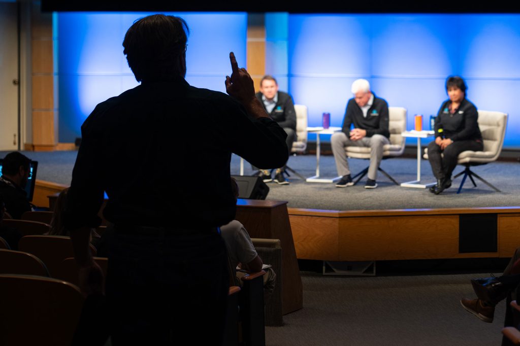TAKING QUESTIONS — Most of the town hall was dedicated to answering employee questions on a variety of topics, including leadership priorities and collaboration within Sandia and with other labs. (Photo by Craig Fritz)