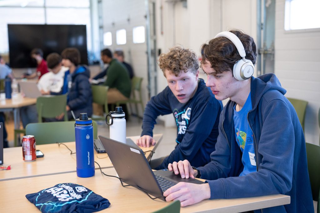 <strong>REAL ONES </strong>— Scott Jolley, a sophomore at Valley High School, left, watches Spencer Jensen, a senior at Valley High School, work during the event. (Photo by David Lienemann)