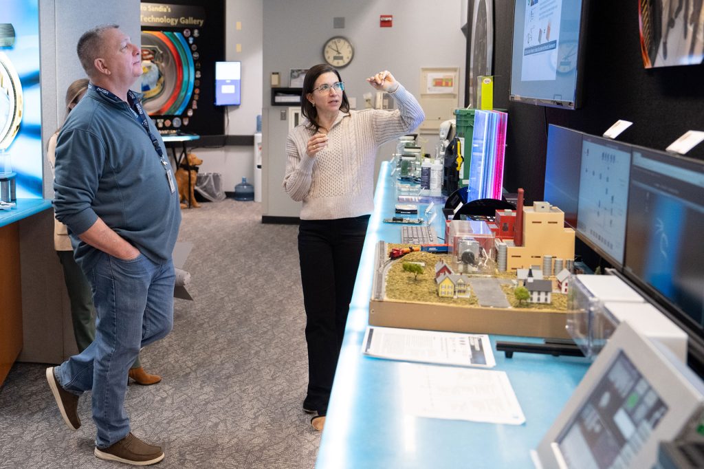 <strong>NA-2 VISIT </strong>— Catherine Green, senior manager for Microsystems Engineering, Science and Applications Sustainment, right, briefs NNSA Principal Deputy Administrator Scott Pappano during a visit to the Labs on Feb. 3. During his visit, Pappano received briefings on MESA, the Annular Core Reactor Research facility, AI and quantum research, hypersonics and satellite space programs and more. He toured the Counterfeit Detection Center, the Consolidated Overhead Ground System and the Weapons Display Area. (Photo by David Lienemann)