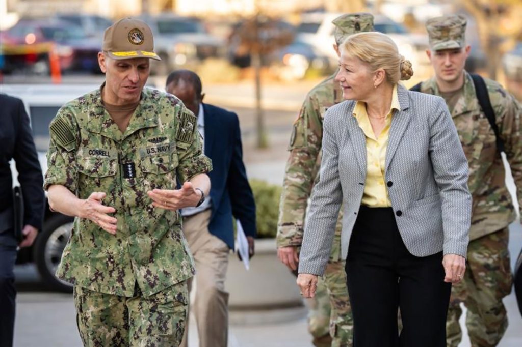 <strong>STRATEGIC SUPPORTER&nbsp;</strong>—&nbsp;U.S. Navy Adm. Rich Correll, commander of U.S. Strategic Command, left, walks and talks with Labs Director Laura McGill during his tour of Sandia on Feb. 11. During his visit, Correll met with Sandia leaders to discuss nuclear deterrence futures, product realization progress and challenges, Microsystems Engineering, Science and Applications, work in AI and quantum, and more. He toured the Weapons Display Area and the Counterfeit Detection Center.&nbsp;(Photo by Craig Fritz)