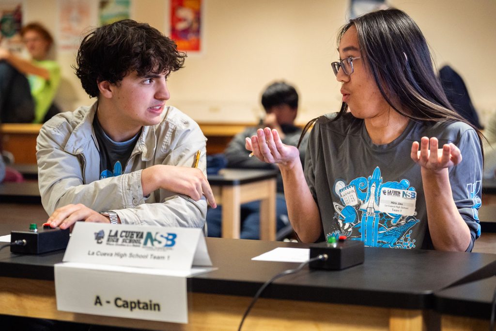 <strong>WHAT A QUESTION</strong>&nbsp;—&nbsp;Roran Hensley, left, and Hiro Jau from La Cueva High School Team 1, discuss their possible answer during the 2026 Regional Science Bowl competition on March 7. (Photo by Craig Fritz)