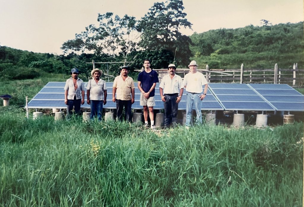 <strong>ENGINEERING FOR AGRICULTURE</strong> — Charles Hanley, right, stands with ranchers in southern New Mexico after helping install a solar water pumping system. (Photo courtesy of Charles Hanley)