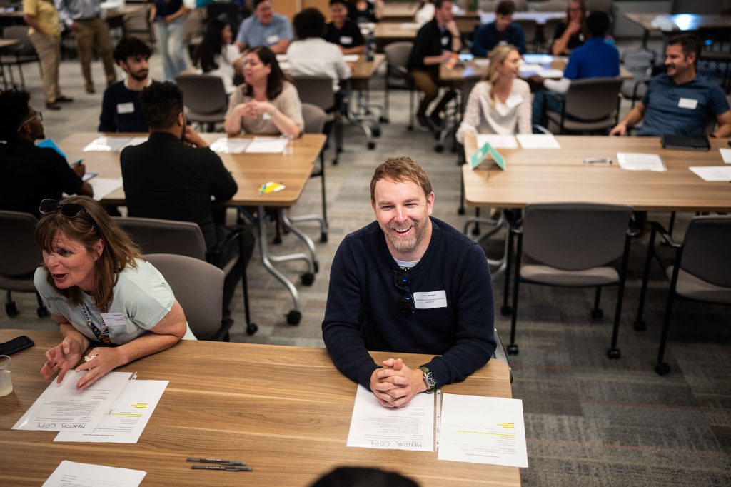 <strong>LEVEL UP</strong> — AI researcher Mike Bernauer provides mentorship and conducts mock interviews on Junior Achievement Job Shadow Day, March 23. During the event, 25 students from Highland High School listened to Sandia panelists discuss their careers, participated in mock interviews and toured the Technology Training and Demonstration area. (Photo by Craig Fritz)