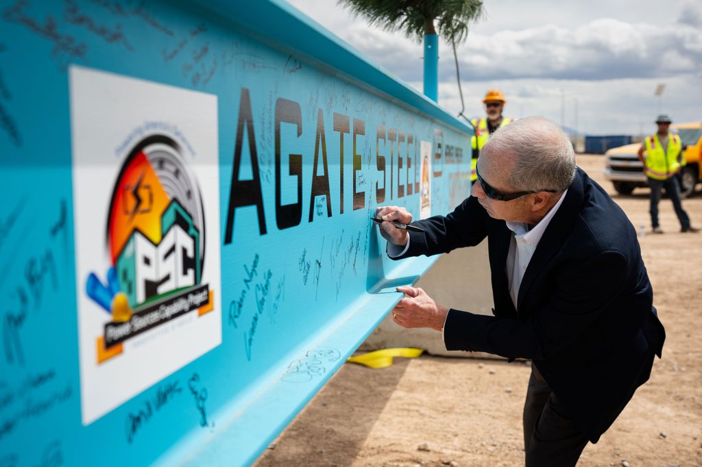 <strong>MAKE A MARK</strong> — Associate Labs Director Steve Girrens signs the ceremonial beam on the Power Sources Capability building during the April 14 ceremony. (Photo by Craig Fritz)