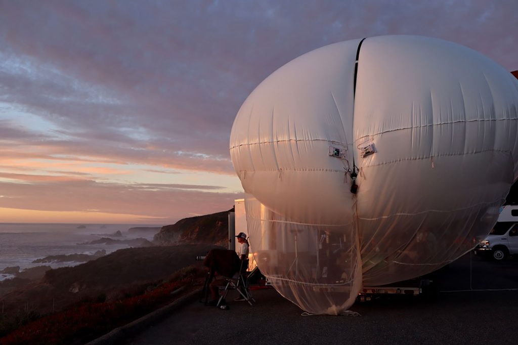 <strong>FIELD WORK</strong> — Sandia’s tethered balloon team participates in measurement campaigns across the country, from the frigid Arctic to the urban Southwest and forested Southeast. (Photo by Antigravity Films)