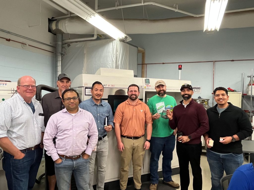 <strong>CLASS IN SESSION</strong> — Sandia additive manufacturing course participants visit the Center for Additive Manufacturing and Design Innovation Lab during Sandia Day 2026 at University of Texas at Austin. From left, Lonnie Love, Mark Dudley, Mohan Karulkar, James Kuthakun, UT Austin professor Matthew Jones, John Cochran, Ziam Ghaznavi and Jose Molina. (Photo courtesy of Melissa Kleinsteuber)