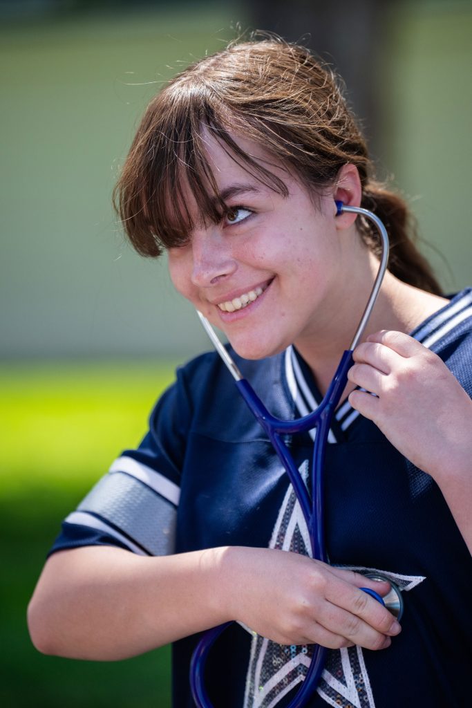 <strong>FEEL THE BEAT</strong> — Megan Phipps listened to her own heartbeat while chatting with medical services staff on Kids Day.