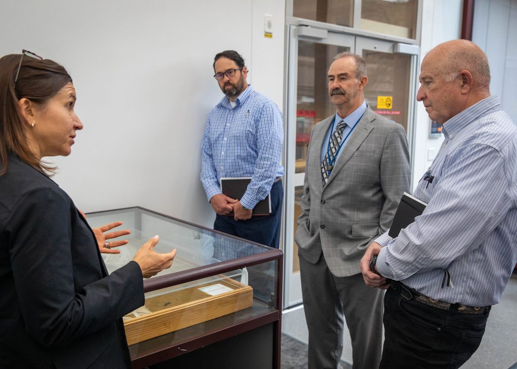 <strong>TOUR DAYS</strong> — NNSA Deputy Administrator for Defense Programs Dave Beck, right, visits the Microsystems Engineering, Science and Applications complex on a tour led by senior manager Catherine Green, left, and joined by, from left, Nuclear Deterrence Chief of Staff Steve Handy and MESA Director Reno Sanchez. During his May 4-5 visit to the Labs, Beck received briefings on Sandia’s work in quantum, artificial intelligence, Laboratory Directed Research and Development for defense programs, mobile guardian transport and more. In addition to MESA, he toured the mobile vault, the Center for Advanced Manufacturing and Innovation, the neutron generator and vibration test facility. (Photo by Alicia Bustillos)