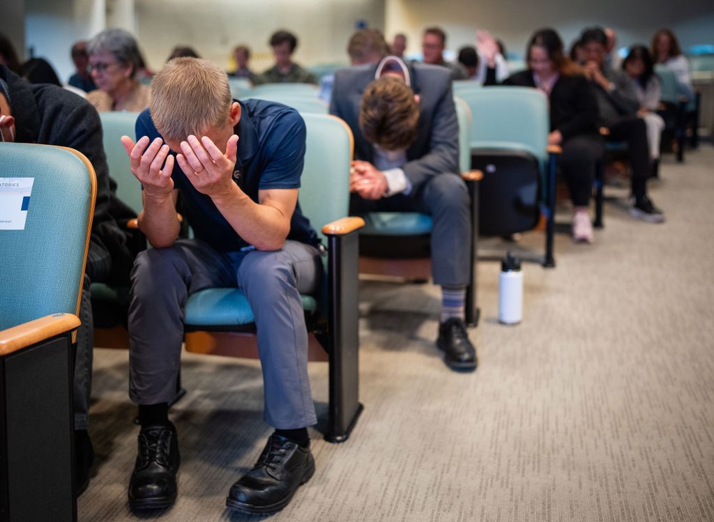 <strong>PRAYER </strong>— Sandians and members of the community gathered to pray during the National Day of Prayer. (Photo by Craig Fritz)