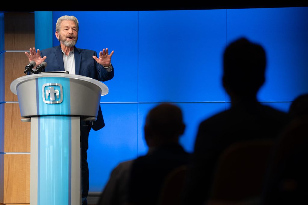 <strong>GATHERING </strong>— Pastor Steve Stucker addresses attendees at the National Day of Prayer in Steve Schiff Auditorium on May 7. (Photo by Craig Fritz)