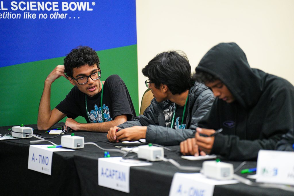 <strong>TEAM ANSWERS</strong> — DOE National Science Bowl winners, from left, Roshan Annamalai, Theenash Sengupta and Advaith Mopuri of Mission San Jose High School in Fremont, California, competed at the Sandia-sponsored regional science bowl competition in January. (Photo by Joshua Lawton, DOE Office of Science)