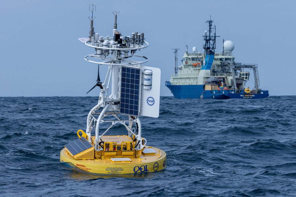 <strong>OUT TO SEA</strong>&nbsp;—&nbsp;The Pioneer Array coastal surface moorings buoy and research vessel Neil Armstrong.&nbsp;(Photo by Taylor Mankle and Joshua Bauer, National Laboratory of the Rockies)