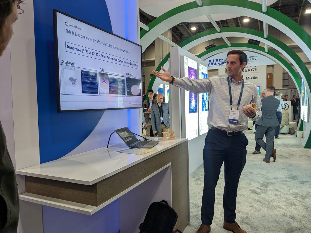 <strong>AI-DRIVEN DESIGN</strong> — Sandia AI researcher Nathan Brown presents AI-Driven Design: Optimizing Products with Natural Language Prompts at AI+ Expo. (Photo by Anthony Garland)