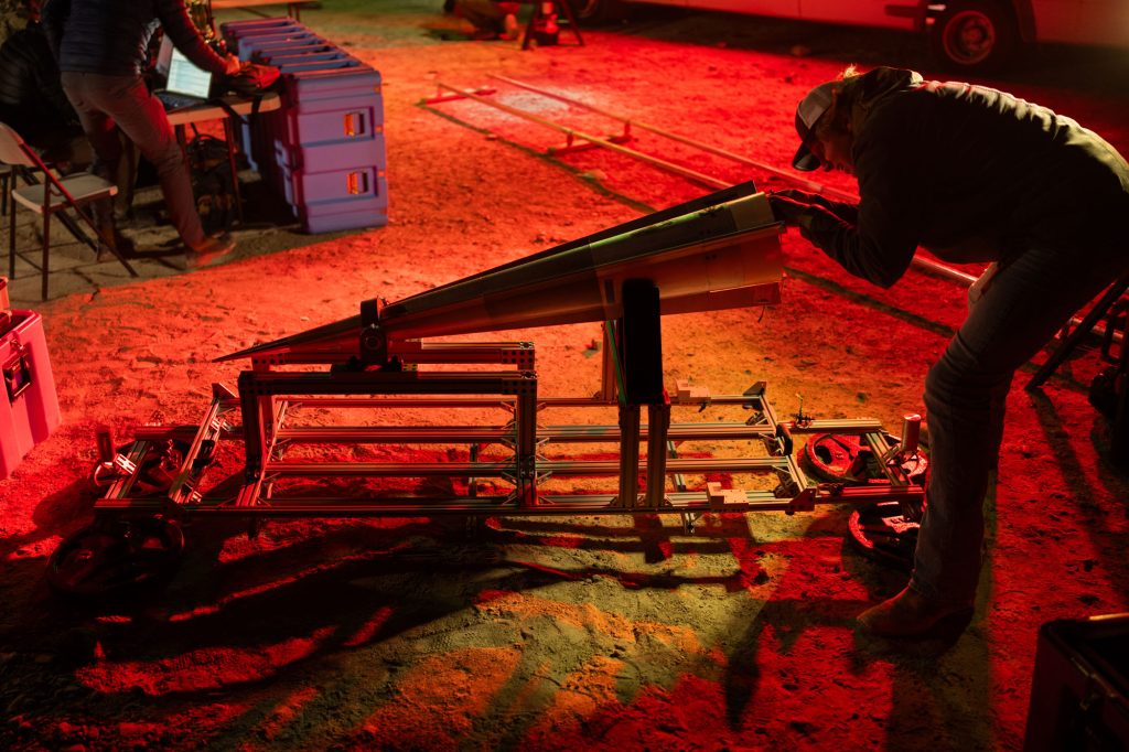 <strong>PREPARATION</strong> — Sandia researchers prepare a 1:2 scale model for release from a hydrogen-filled balloon at Dugway Proving Ground, Utah. (Photo by Craig Fritz)