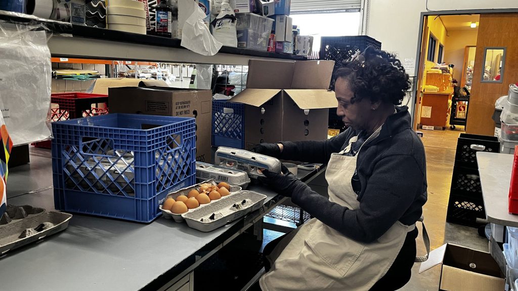 <strong>GOOD EGGS&nbsp;</strong>—&nbsp;Manager Anetha Lue sorts through eggs to remove damaged ones at Tracy Interfaith.&nbsp;(Photo by Michelle Walker-Wade)