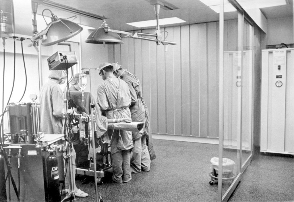 <strong>HOSPITAL CLEANROOMS</strong> — In this 1964 photo taken at Charles S. Wilson Memorial Hospital cleanroom technology is used in the operating room. This technology continues to be used in hospitals to prevent infection in operating and recovery rooms. (Photo from the Sandia archives)