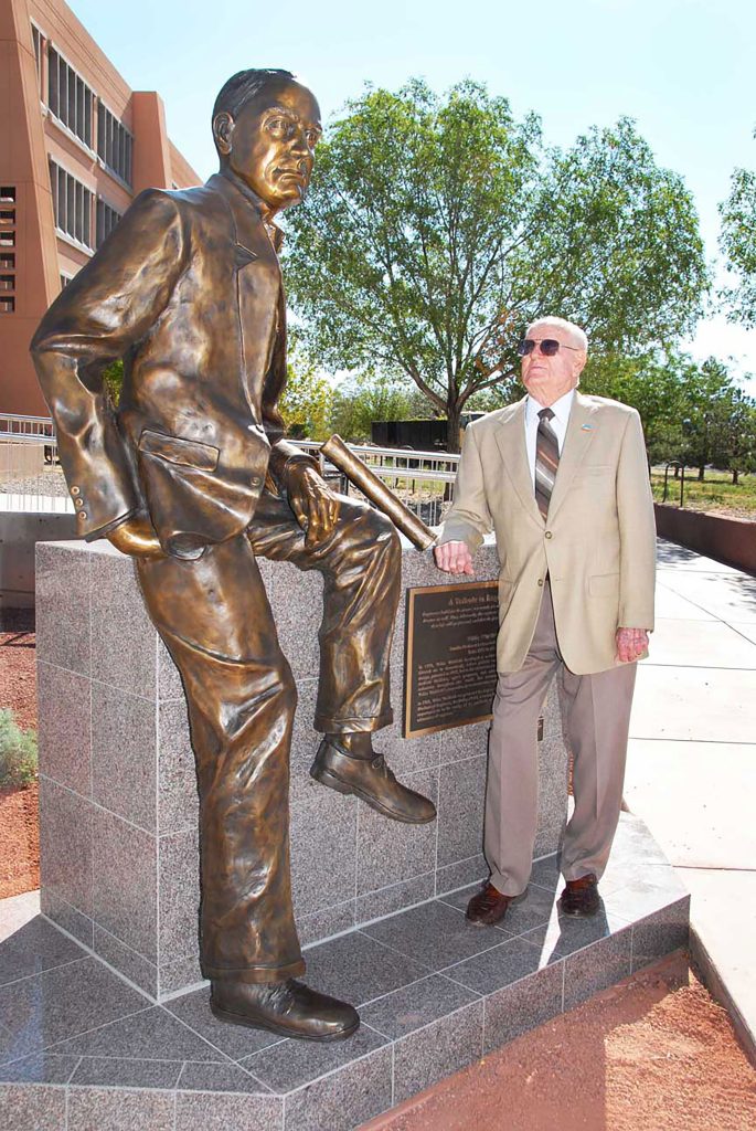 <strong>TWINS</strong> — In this 2007 photo, Willis Whitfield stands next to a statue of himself that was unveiled at the MESA dedication ceremony that summer. (Photo from Randy Montoya)