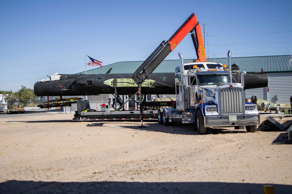 <strong>A LONG JOURNEY</strong>&nbsp;—&nbsp;A semitruck carries the fuselage of the U-2 plane into Heritage Park at the National Museum of Nuclear Science & History on May 22, after a lengthy trip from Beale Air Force Base in Yuba County, California.&nbsp;(Photo by Lyndsee Cantly, National Museum of Nuclear Science & History)