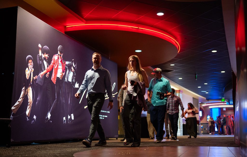<strong>BIG SCREEN SUCCESSES</strong> — Employee Recognition Award winners arrive at the Regal Winrock Theater for the award ceremony in New Mexico. This unique venue offered a fun and “regal” atmosphere for the annual event. The Labs Director’s Award portion of the awards ceremony was held at Winrock Park after the division awards. (Photo by Craig Fritz)