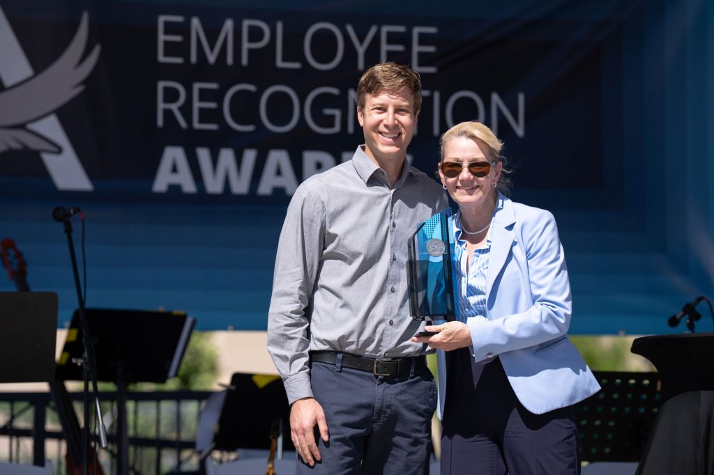 <strong>MGT PROTOTYPE</strong> — Representing the Mobile Guardian Transporter Prototype Team, Jason Berger accepts the Labs Director’s Award for his team’s collaboration. (Photo by Craig Fritz)