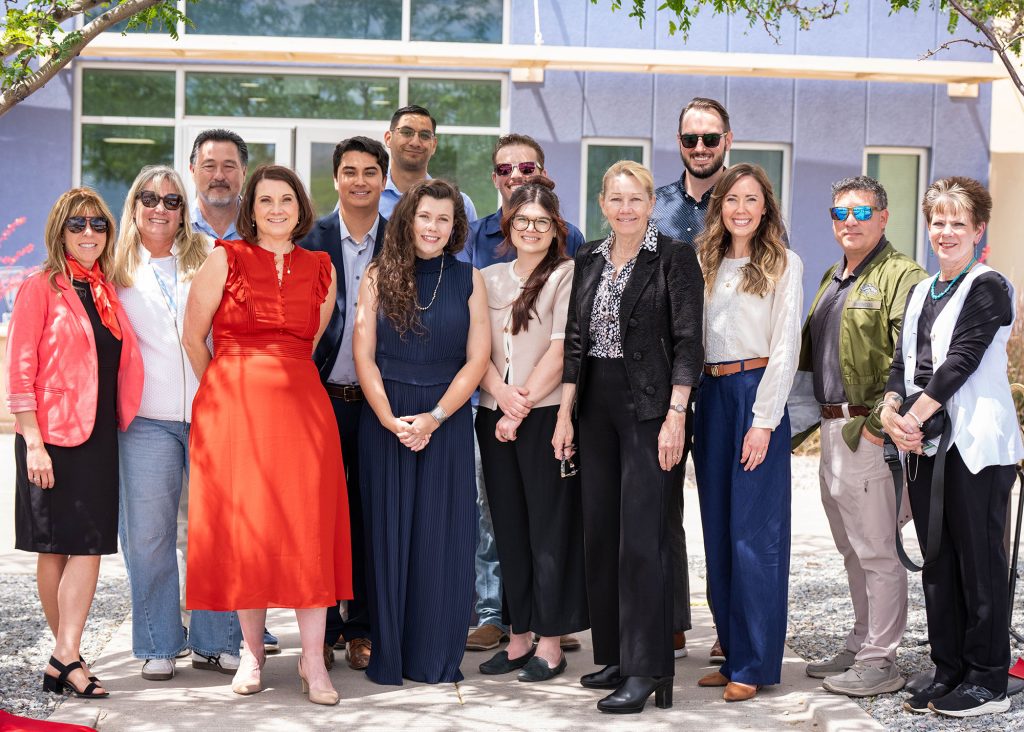 <strong>TEAM EFFORT&nbsp;</strong>—&nbsp;Members of the project team from several organizations celebrating their accomplishments with Labs Director Laura McGill. From left, Julie Kelly-Smith, Joan Yourick, Nathan Sanchez, Katie Roberson, Krystian Gomez, Josh Cosio, Madison Meenan, Jillian Baloy, Kyle Ruth, Laura McGill, Josh Johnson, Carolyn Barrios, Matthew Brito and Jeanne Oselio.&nbsp;(Photo by Alicia Bustillos)