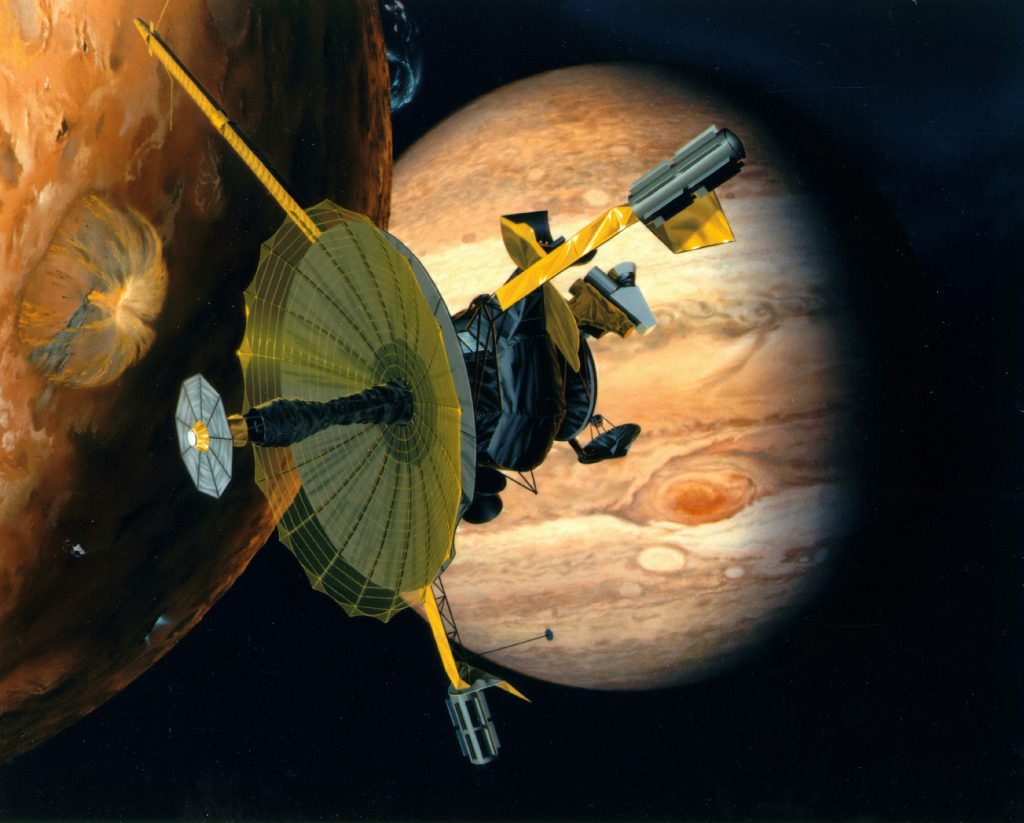 <strong>YO, IO!</strong> — Artist rendering of NASA’s Galileo spacecraft flying past Jupiter’s moon, Io. Galileo would make several close approaches to the volcanically active moon during its orbit around Jupiter. (Photo courtesy of NASA)