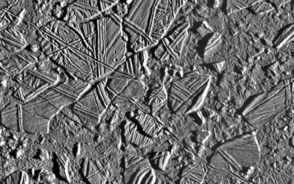 <strong>SPLASHY DISCOVERY</strong> — One of the mission’s most significant findings was that a vast liquid ocean existed below Europa’s icy crust, pictured here. (Photo courtesy of NASA)