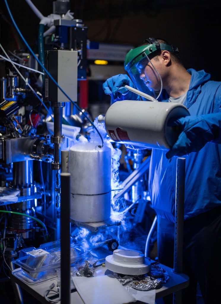 <strong>CHILL WORK</strong> — At Sandia California, Feng-Jen Chang pours liquid nitrogen to cool down a sample manipulator. Opportunities to work in cutting-edge science, technology and engineering are a draw for prospective employees.