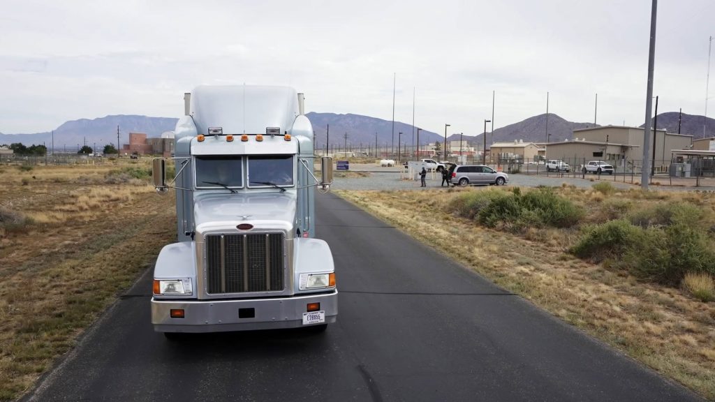 <strong>FINAL DRIVE</strong> — The second prototype of the Mobile Guardian Transporter test vehicle arrives at Sandia’s sled track facility for a head-on crash. Test results will help qualify the Mobile Guardian Transporter design, ahead of full-rate production. (Photo by Joel Ortiz)