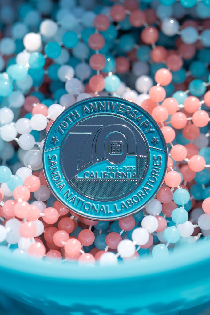 <strong>PLATINUM ANNIVERSARY</strong> — Sandia California marked its 70th anniversary with a custom challenge coin. (Photo by Spencer Toy)