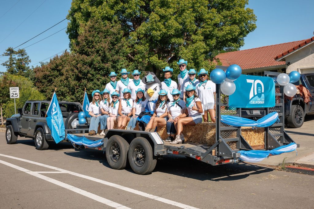 <strong>SADDLE UP</strong> — Sandians decorated a western-themed float for the 108th annual Livermore Rodeo Parade and handed out commemorative Sandia stickers and necklaces to roughly 15,000 parade-goers. (Photo by Spencer Toy)