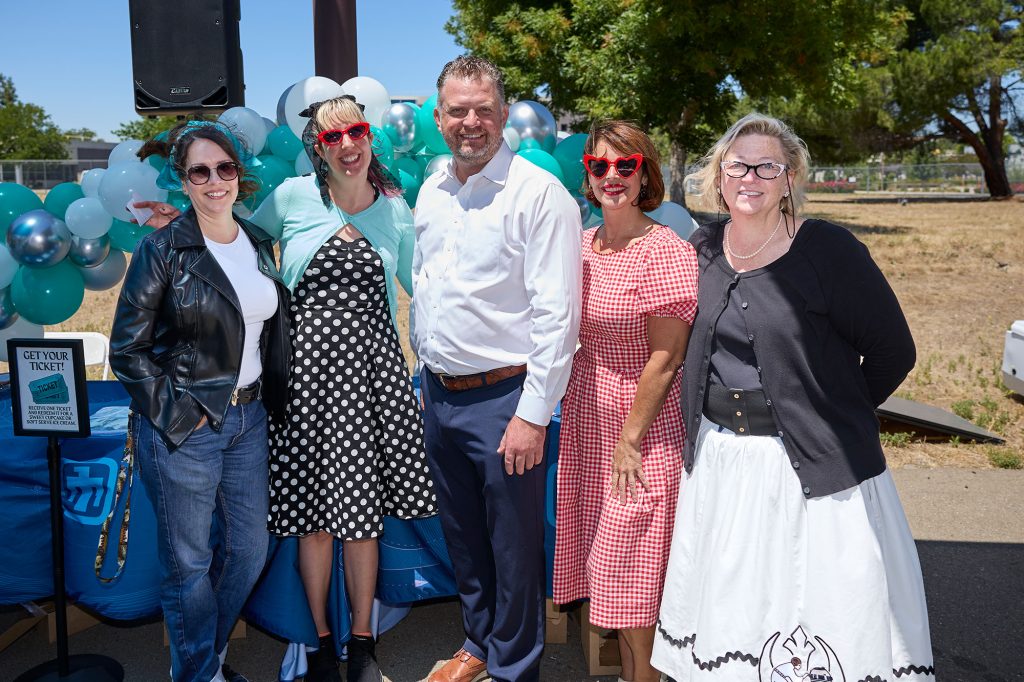 <strong>FABULOUS FIFTIES</strong> —Sandia California Associate Labs Director Toby Townsend, center, poses with participants of the 1950s costume contest during the Then & Now Wellness Fair. (Photo by Garry McLeod)