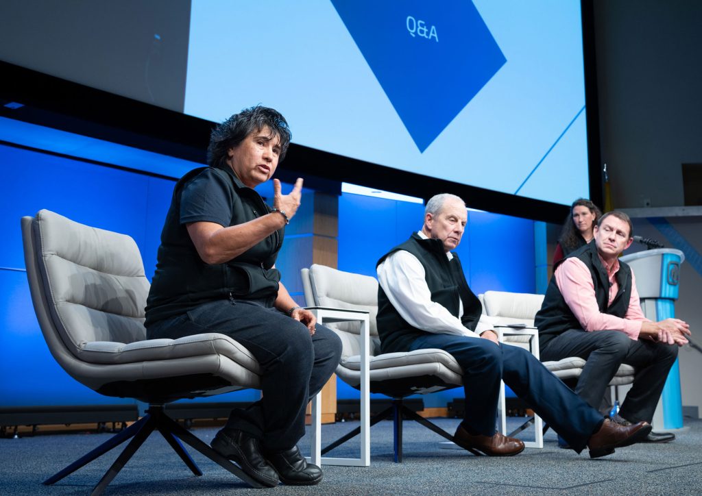 <strong>BIG AND BOLD</strong> — Deputy Laboratories Director of Nuclear Deterrence & Science Rita Gonzales, left, engages an audience alongside Associate Laboratories Directors Steve Girrens, center, and Brad Boswell as they field questions from staff during the Nuclear Deterrence & Science strategy town hall at Steve Schiff Auditorium on Aug. 27.<br>During the event, leaders officially unveiled the new Nuclear Deterrence & Science strategy, a comprehensive blueprint outlining strategic drivers, objectives, and the critical technical and cultural imperatives and attributes that guide Sandia's work today and into the future. Nuclear Deterrence & Science leadership, including Associate Labs Director Doug Kothe, who joined virtually from California, shared their vision for the workforce, highlighted cutting-edge projects that are already advancing strategic goals, and demonstrated how the new strategy seamlessly integrates with Sandia’s broader mission and strategic priorities.<br>The event also offered opportunities for staff to connect and network, fostering collaboration across teams. (Photo by David Lienemann)