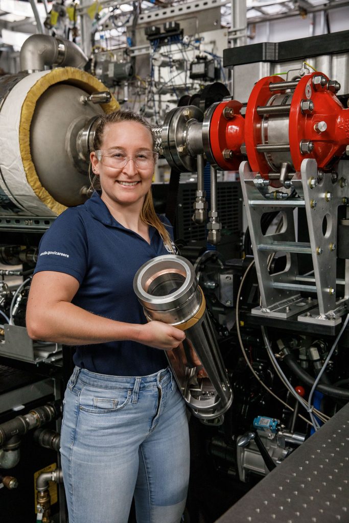 <strong>INNER SPACE</strong> — Engineer Kyra Schmidt holds the equipment she helped plan for and install into the updated lab at Sandia California. (Photo by Spencer Toy)