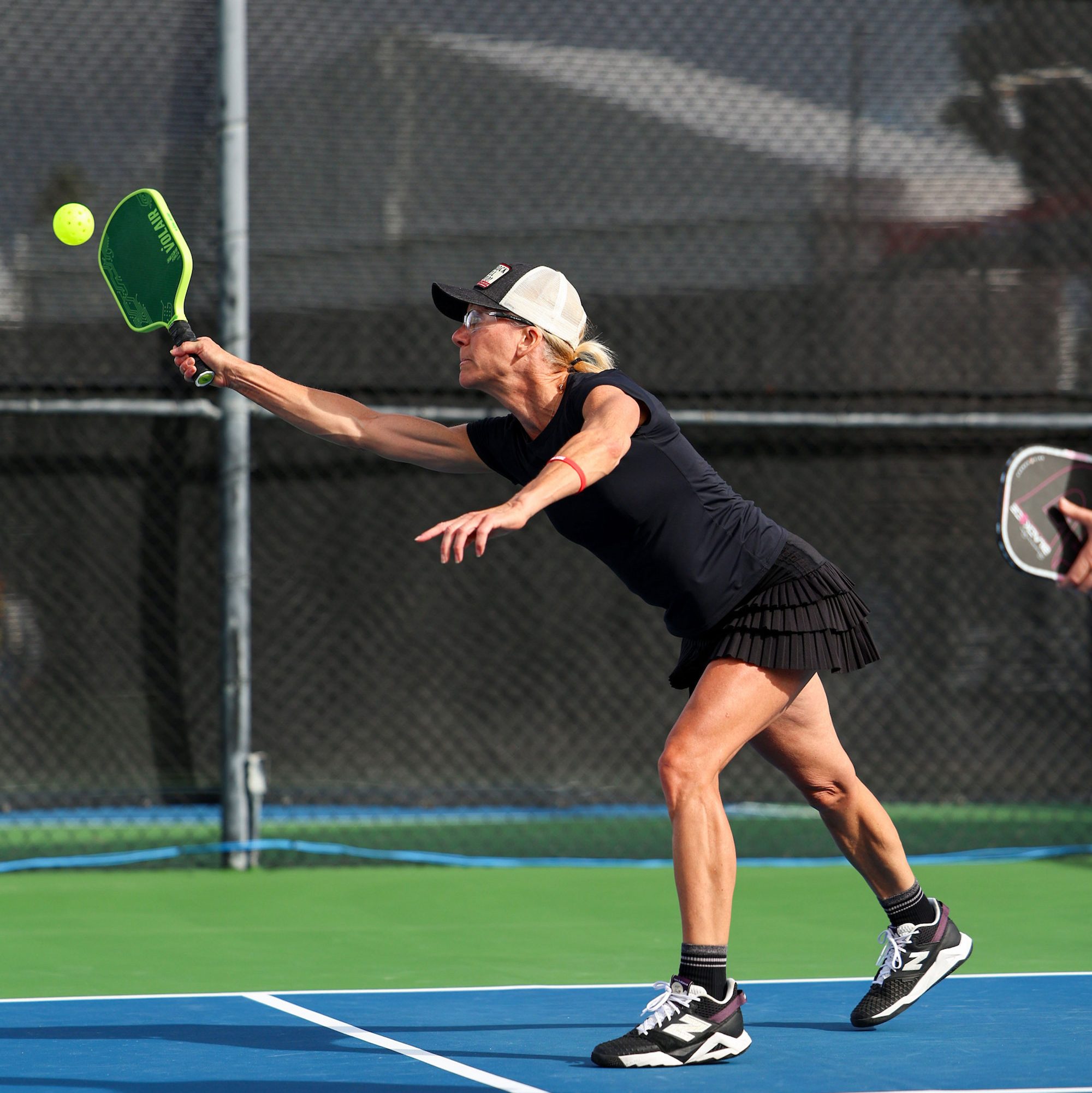 <strong>REACH FOR IT</strong> — Keri McArthur plays in the USA Pickleball National Championships in San Diego. (Photo by Anna Carrington)
