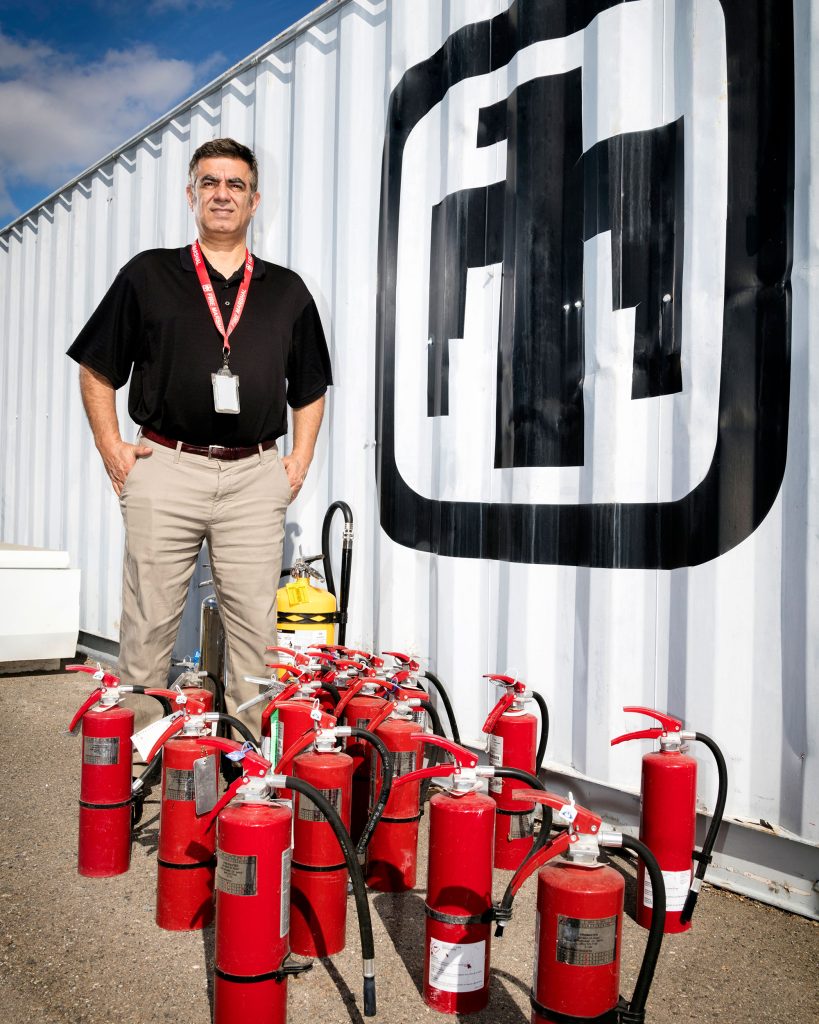 <strong>PREPARED</strong> — Mo Mosallaei prepares for his hands-on fire extinguisher training course at the Sandia California site. Mo teaches these training sessions four to five times a year as part of his role as fire marshal. (Photo by Spencer Toy)