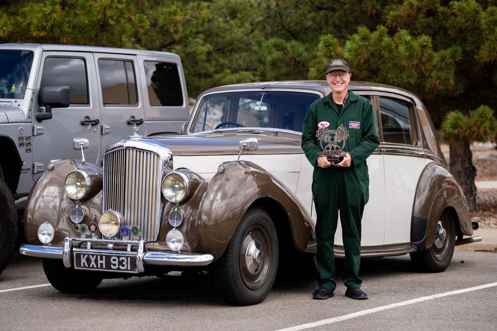 <strong>SUITED UP TO WIN</strong> — Mark Dodd’s 1949 Bentley scored the Committee’s Choice Award. He guesses the car has 156,000 miles on the odometer.