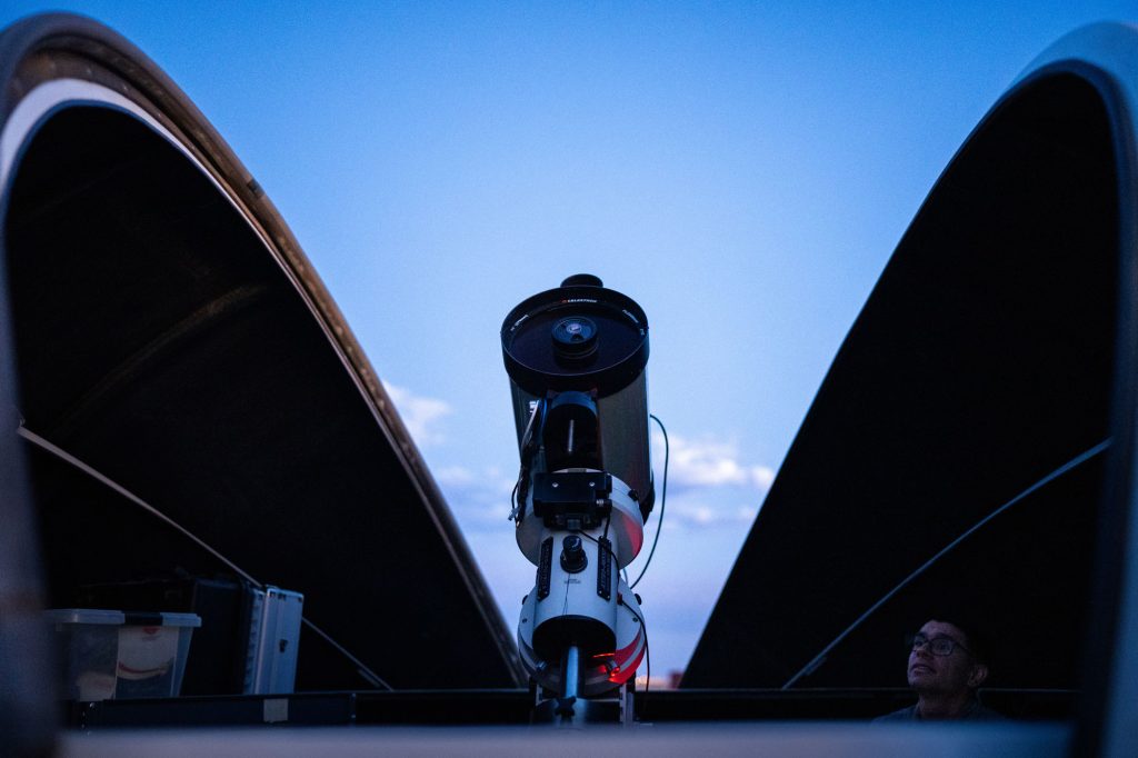 <strong>EYES ON THE SKY</strong> — Allen Schnibben works at Sandia’s SOHBRIT observatory, which plays an important role conducting experiments and testing for the Labs’ space mission. (Photo by Craig Fritz)